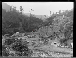 Goldmine (Sylvia Reduction Works) beside the Tararu Creek, Thames-Coromandel District, including native bush and mine structure. Beere, Daniel Manders, 1833-1909 :Negatives of New Zealand and Australia. Ref: 1/4-034283-G. Alexander Turnbull Library, Wellington, New Zealand. /records/22422377